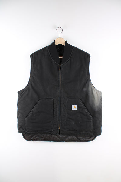 All black Carhartt heavy duty cotton workwear gilet with quilted lining