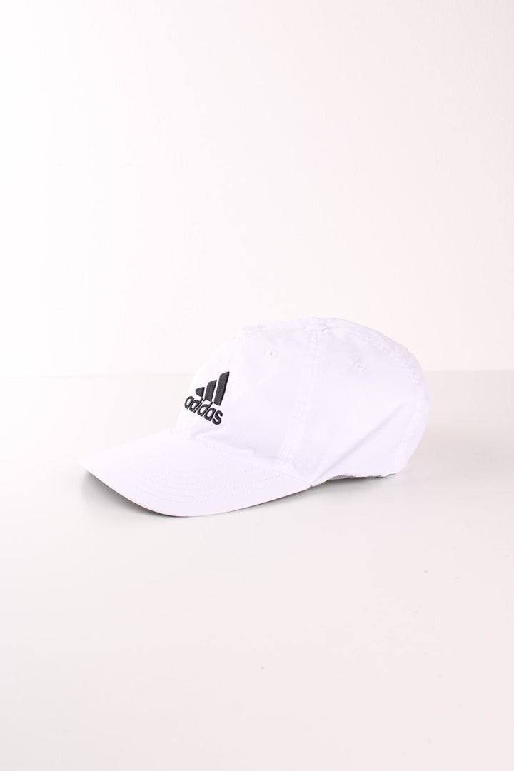 Adidas all white lightweight sporting cap with black embroidered logo on the front and snap adjustable strap