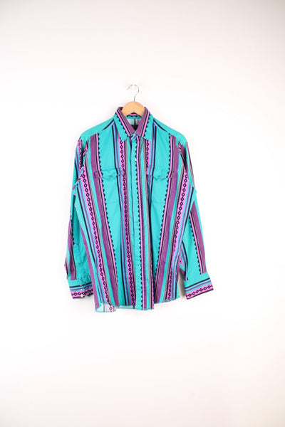 Vintage Western Patterned Shirt in a green, purple and black colourway, button up, double chest pockets, and has patterned striped design throughout. 