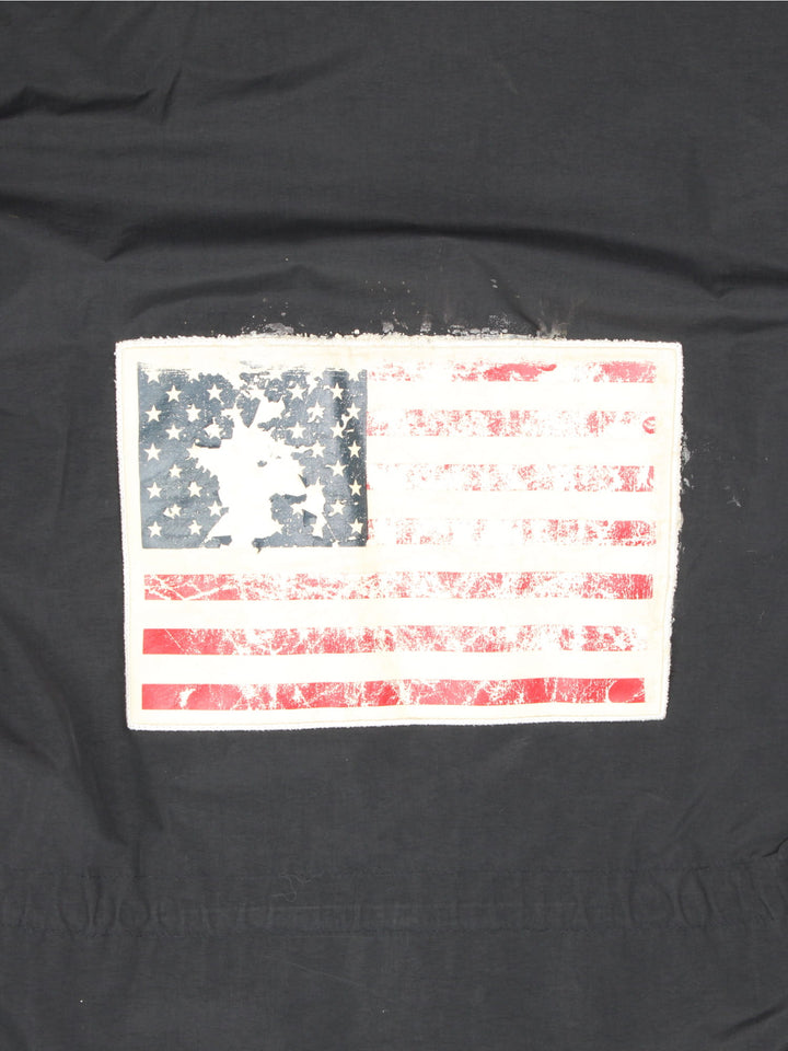 Supreme x The North Face Trans Antarctica expedition pullover jackets, features decorative patches featuring the US flag