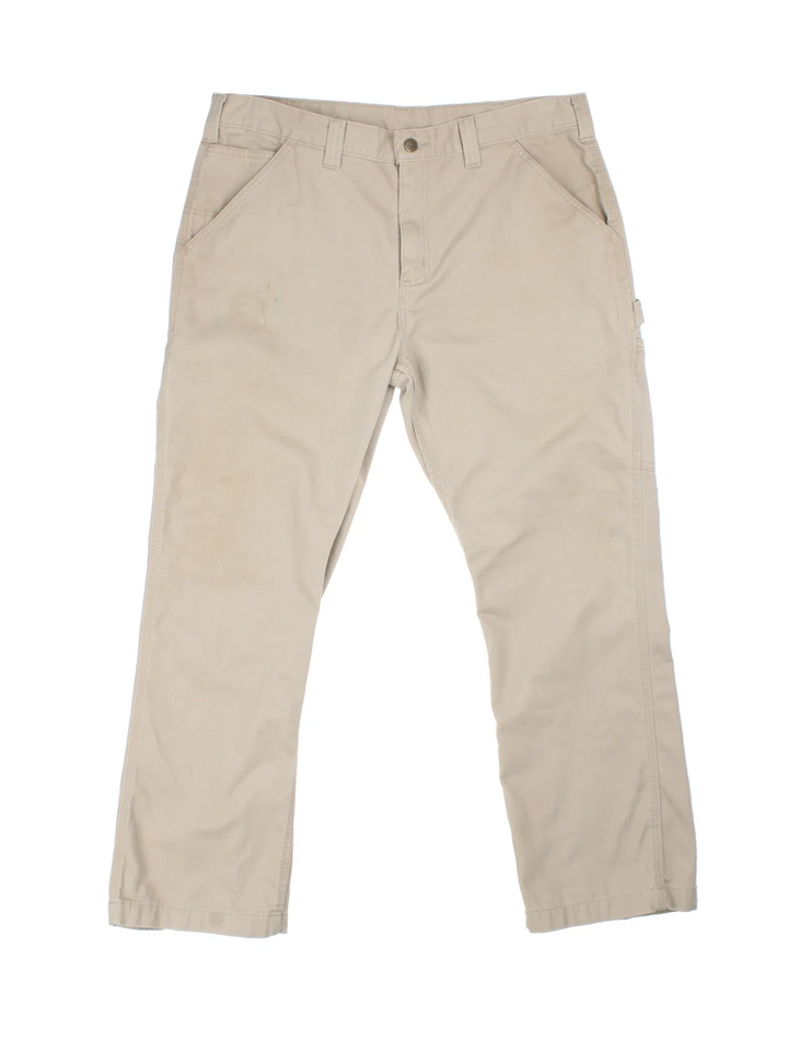 Carhartt Trousers in tan colourway with multiple pockets and the logo embroidered on the back.