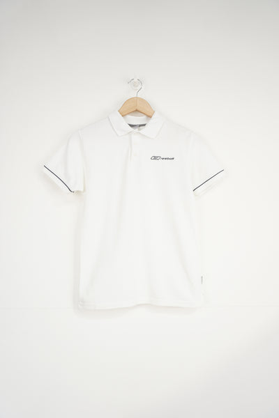 All white Reebok polo shirt with embroidered logo on the chest