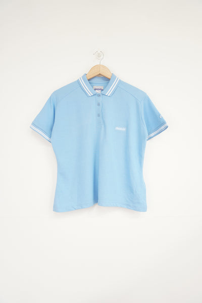 Baby blue Reebok polo shirt with embroidered logo on the chest 