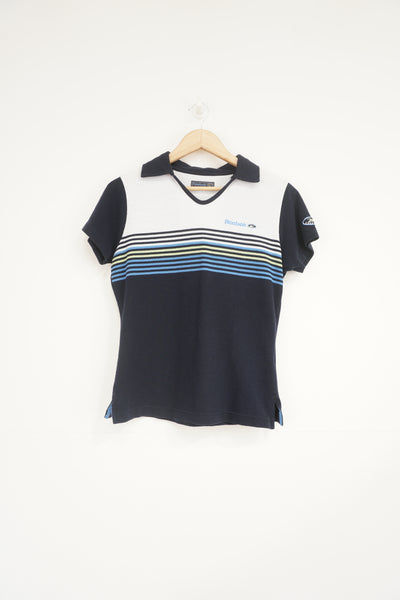 Navy blue Reebok Freestyle polo shirt with embroidered logo on the chest
