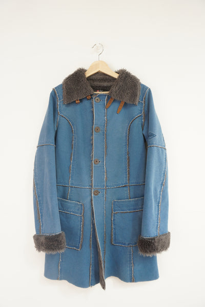 Y2K Diesel blue denim afghan coat with faux fur lining and buckle details on the collar