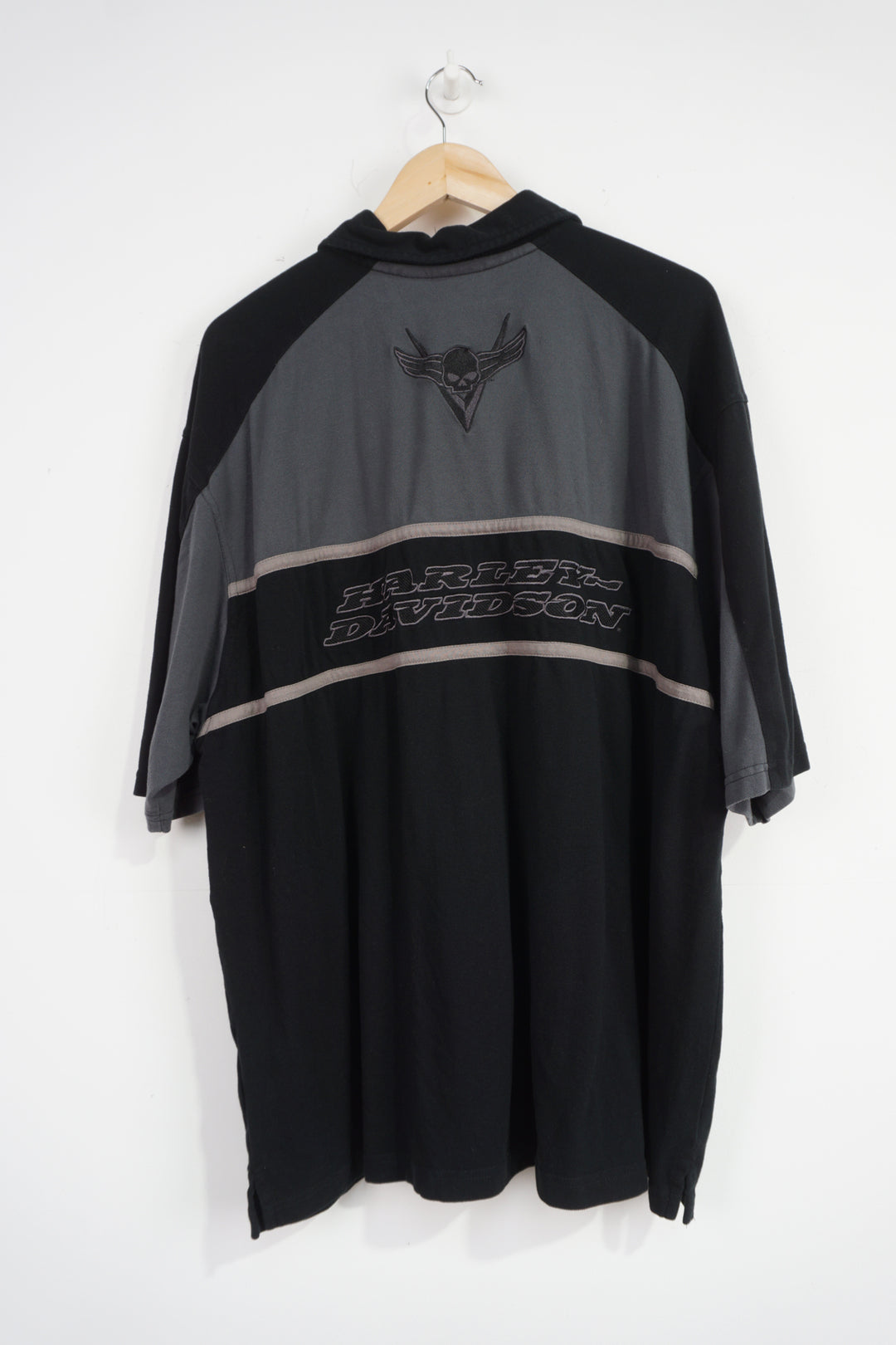 Harley Davidson black and grey polo shirt with embroidered spell-out logo on the front and back