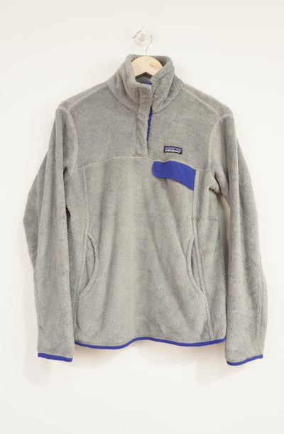 Patagonia grey fleece with 1/4 popper button fastening and embroidered logo on the chest