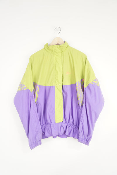 Vintage 90's Nike green and purple zip through shell jacket with embroidered logo on the chest and badge on the back