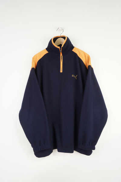 Vintage navy blue and yellow Puma, pull over fleece with embroidered logos on the chest, hem and 1/4 zip fastening
