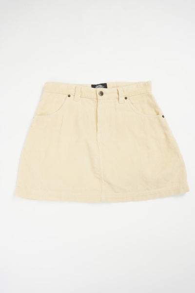 Pastel yellow corduroy Dickies carpenter style mini skirt with logo on the pocket