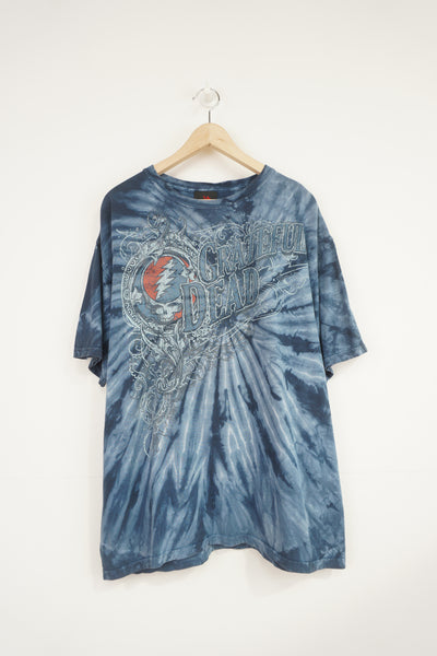 Grateful Dead blue tie dye t-shirt with spell-out graphic on the front