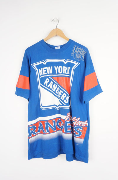 Vintage MFL New York Rangers blue t-shirt with white and red printed Rangers graphic on the front and back. Made by Salem Sportswear in 1994 with single stitch seams.  good condition - some slight cracking to the graphic (please see photos)