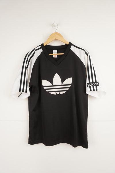 Vintage 90's Adidas v-neck black and white football top with raised logo on chest