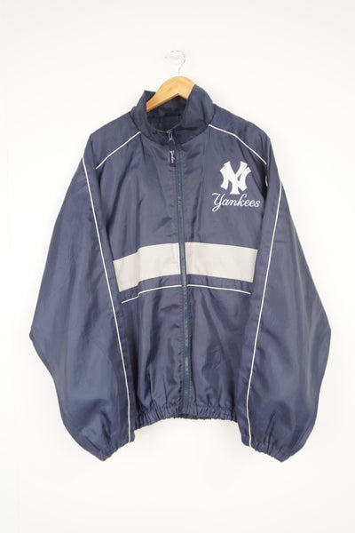Vintage New York Yankees MLB lightweight pro sport jacket with embroidered spell-out logo on the front and back