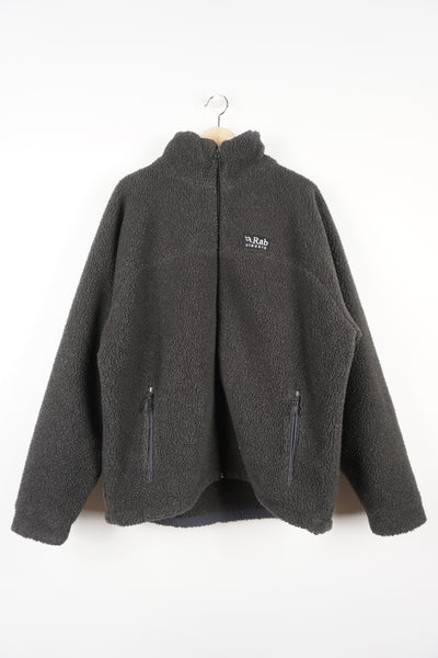 RAB dark grey teddy style zip through fleece features embroidered logo on the chest