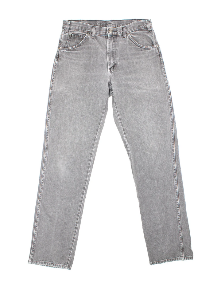 Dickies Jeans in grey colourway with multiple pockets and the logo embroidered on the back.
