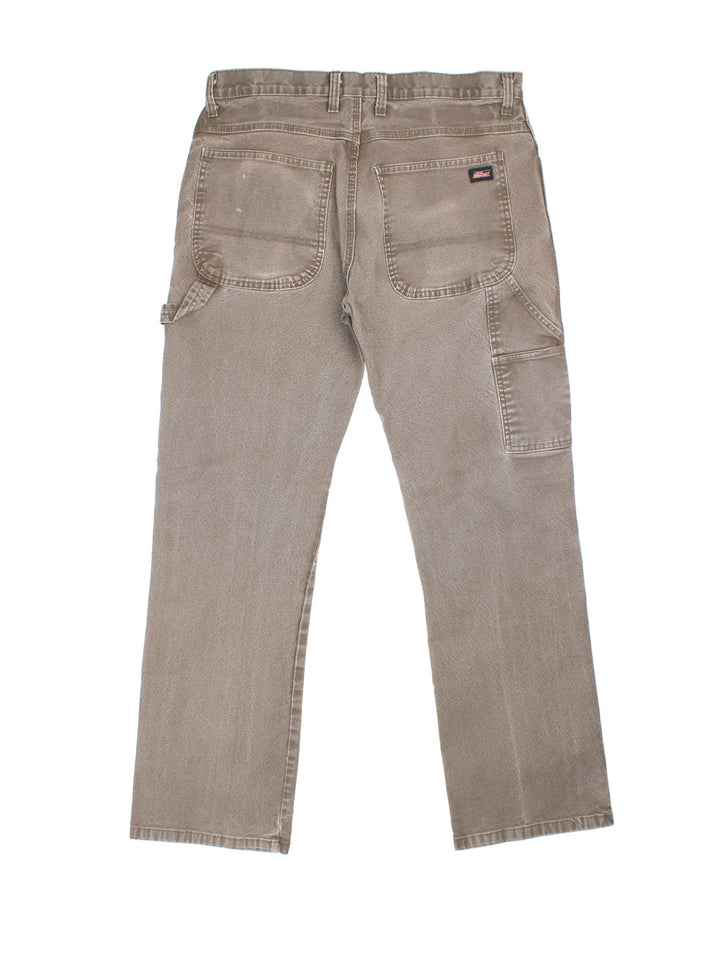 Dickies Carpenter Jeans in brown colourway with multiple pockets and the logo embroidered on the back.