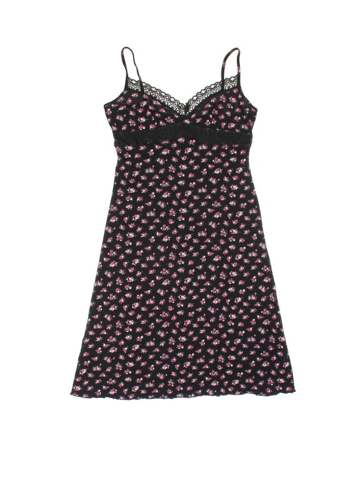 Vintage Y2K Ditsy Floral Mini Dress in black/pink colourway with frill hemline and lace bust detail.