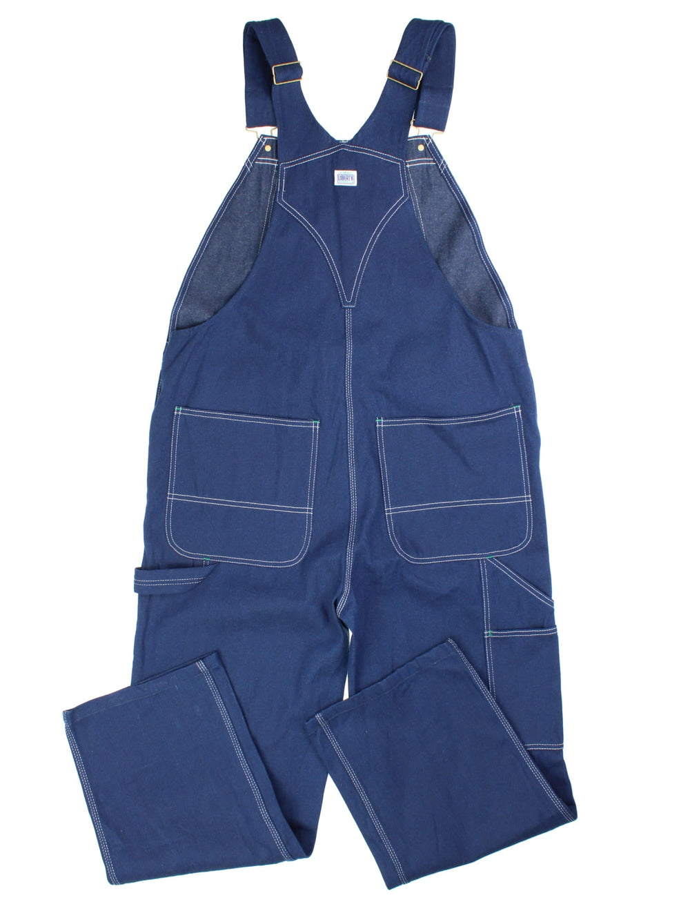 Vintage Liberty Dungarees in blue colourway with multiple pockets, adjustable straps, and the logo embroidered on the front.