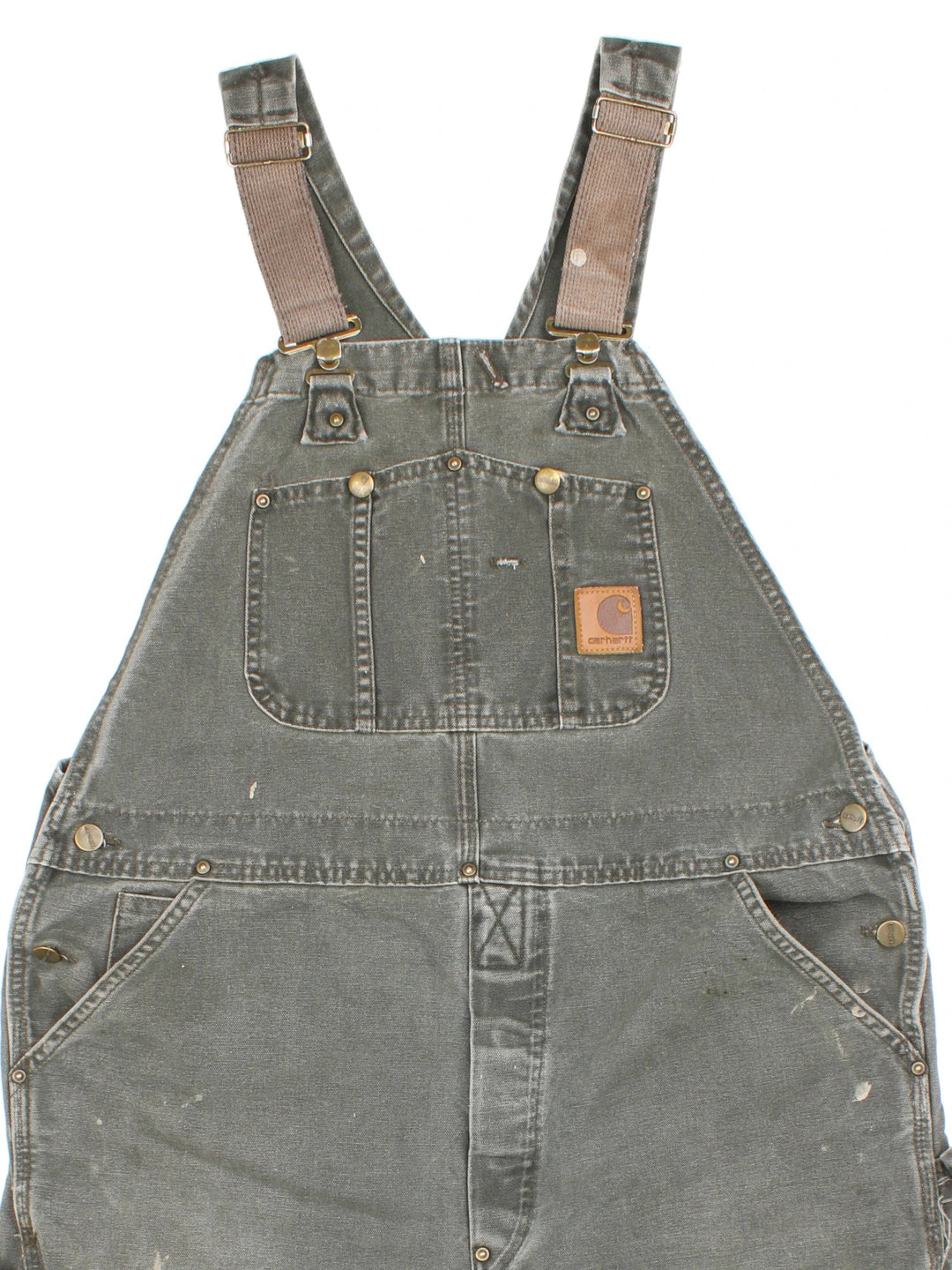 Carhartt Dungarees in green colourway with multiple pockets, adjustable straps and the logo embroidered on the front.