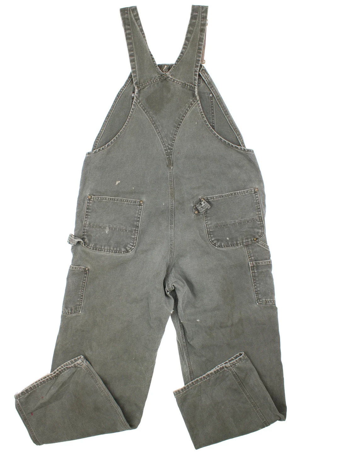 Carhartt Dungarees in green colourway with multiple pockets, adjustable straps and the logo embroidered on the front.