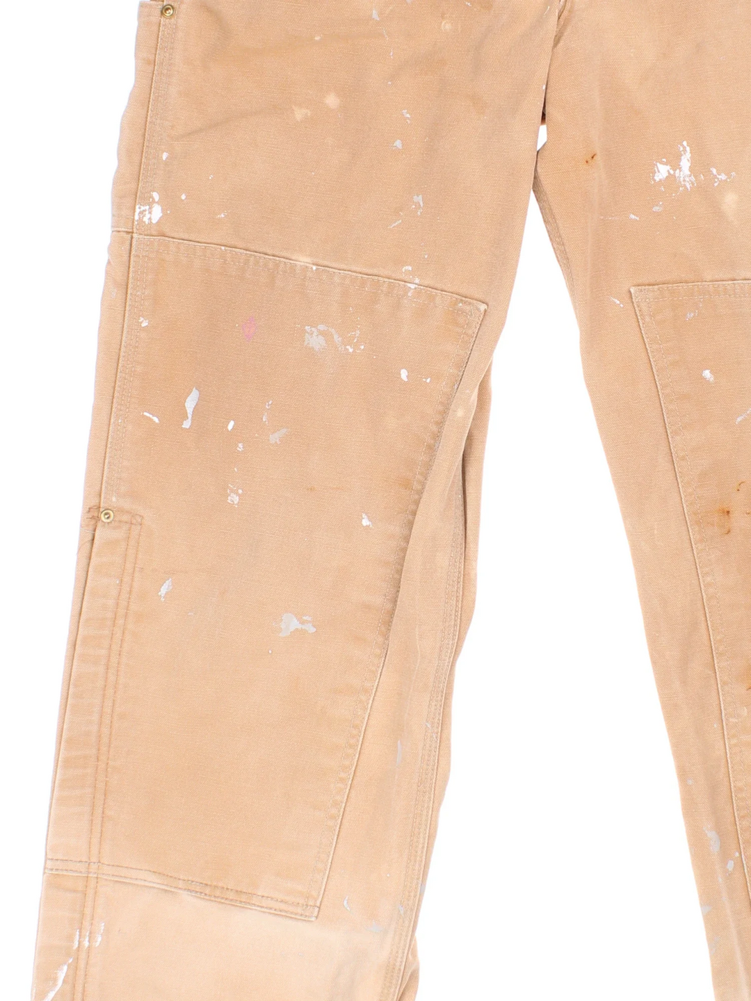 Carhartt Dungarees in tan colourway with multiple pockets, adjustable straps and the logo embroidered on the front.