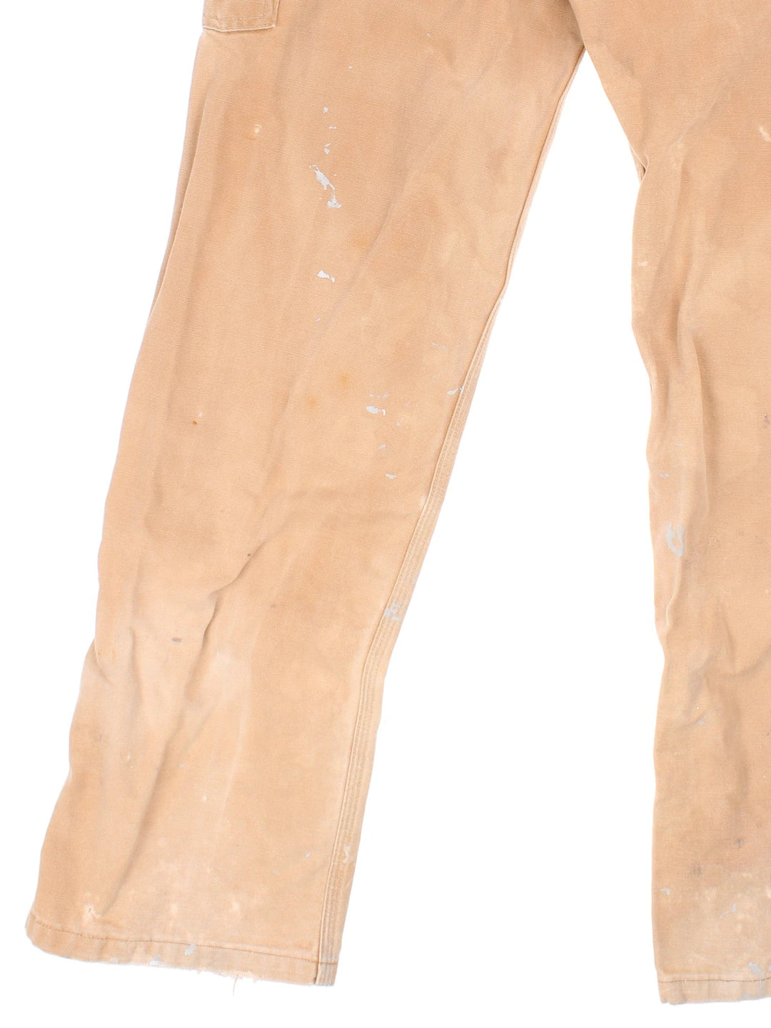 Carhartt Dungarees in tan colourway with multiple pockets, adjustable straps and the logo embroidered on the front.