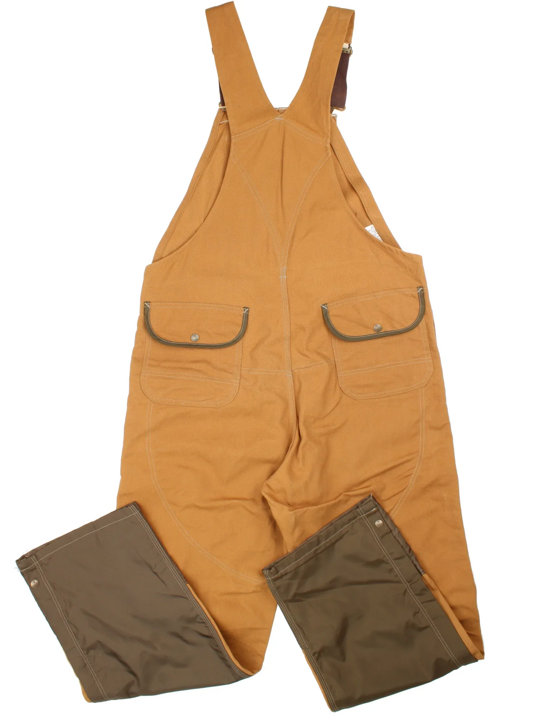 Carhartt Dungarees in tan colourway with multiple pockets, adjustable straps and the logo embroidered on the front.