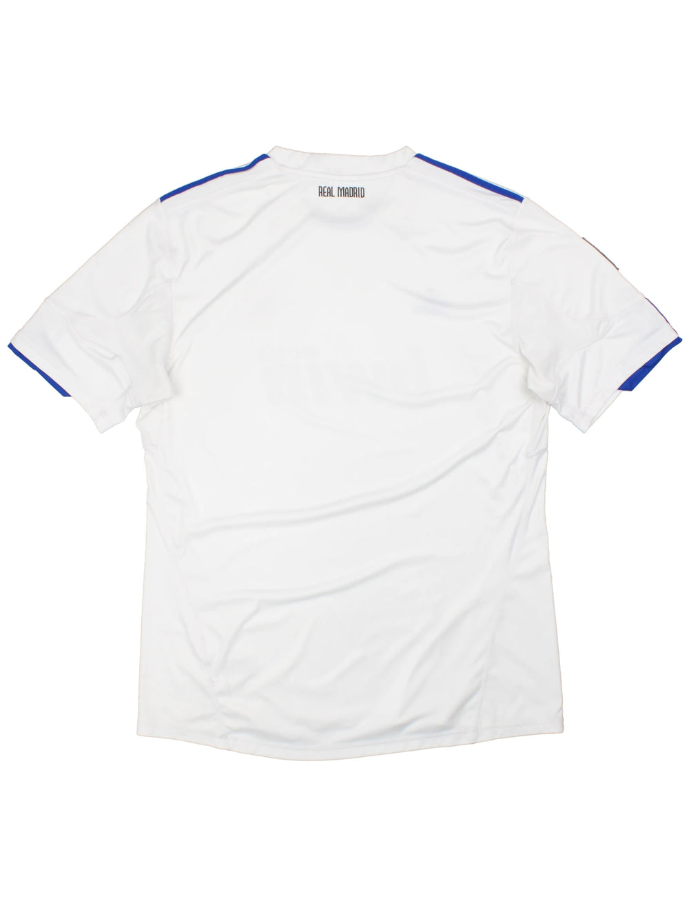 Real Madrid 2010/11  Football Shirt in the  home kit colourway, features embroidered logos and badge on the front.