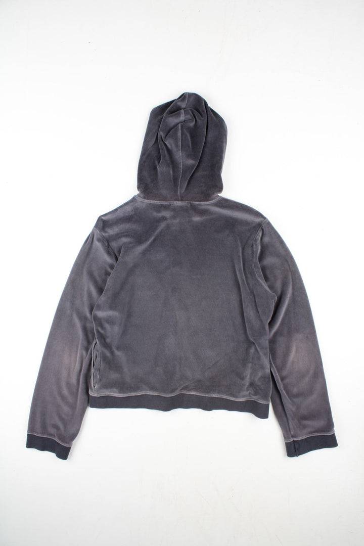 Vintage Reebok Velour Hoodie in a grey colourway. Zip up fastening with side pockets, branding embroidered on front.