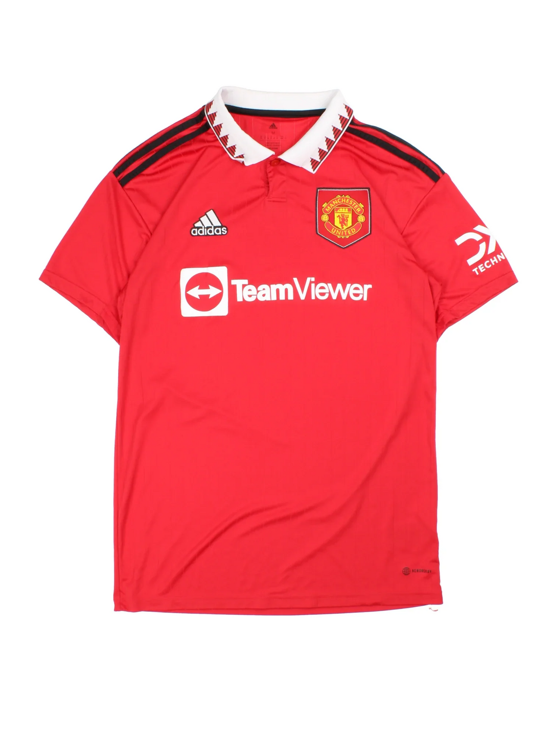 Manchester United 2002/23 Adidas Football Shirt in the red home kit colourway, features printed logos and badge on the front with the classic adidas 3 stripe on the sleeve and button collar.