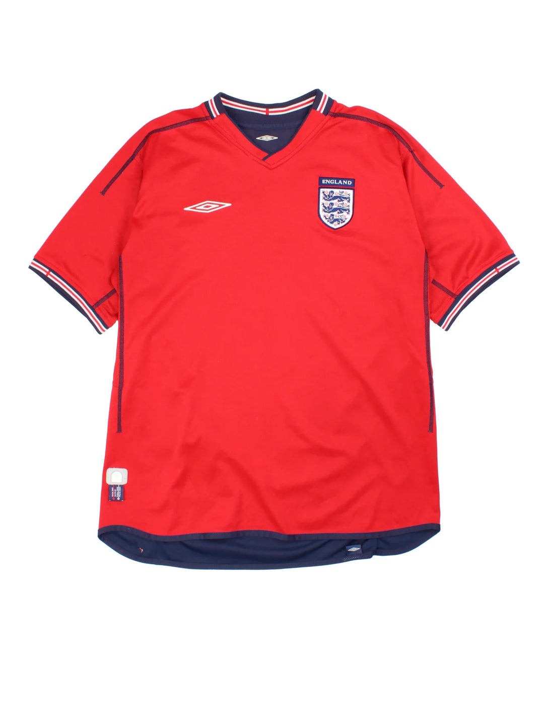 England 2002/04 Umbro Football Shirt in the red away kit colourway with reversible blue side, features printed logos and badge on the front.