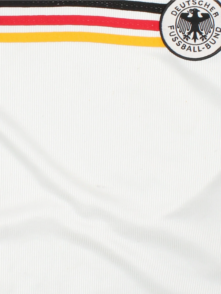 Germany 1998/00 Adidas Football Shirt in the white home kit colourway, features logos and badge on the front with the classic adidas 3 stripe across the middle.
