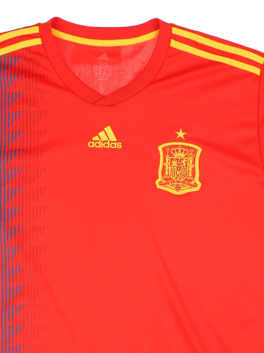 Spain 2018/19 Adidas Football Shirt in the red home kit colourway, features embroidered logos and badge on the front and zig zag patterning.