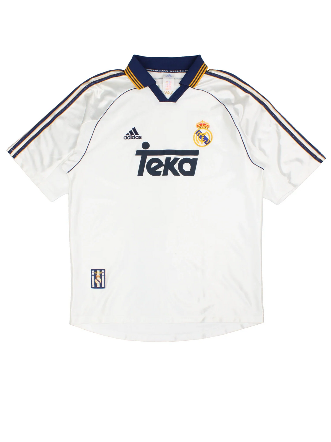 1998/00 Real Madrid Adidas Football Shirt in a white colourway with the classic adidas 3 stripe along the sleeve and gold detailing. Logo and badge on the front with vintage sponsor.
