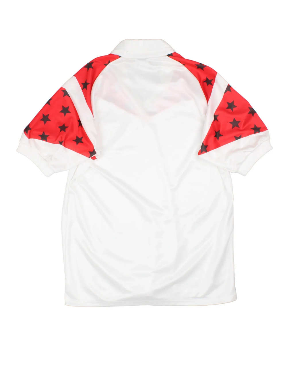 Vintage Puma Football Shirt in a white colourway with red star detailing over shoulders, collar and small logo on the front.