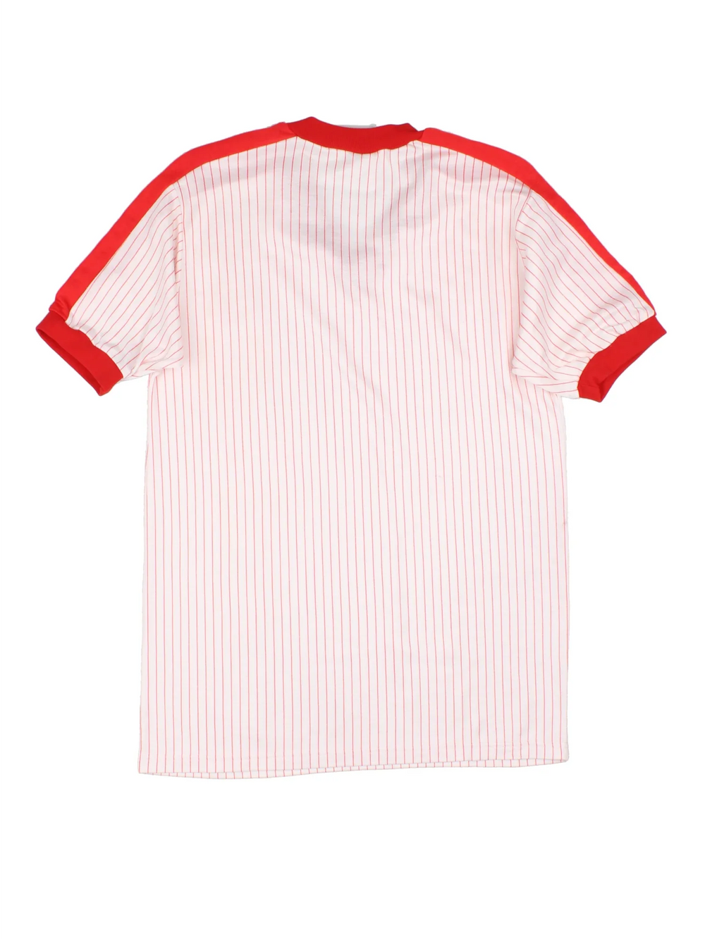 Vintage Puma Football Shirt in a white colourway with red detailing over shoulders, stripes all over and small logo on the front.