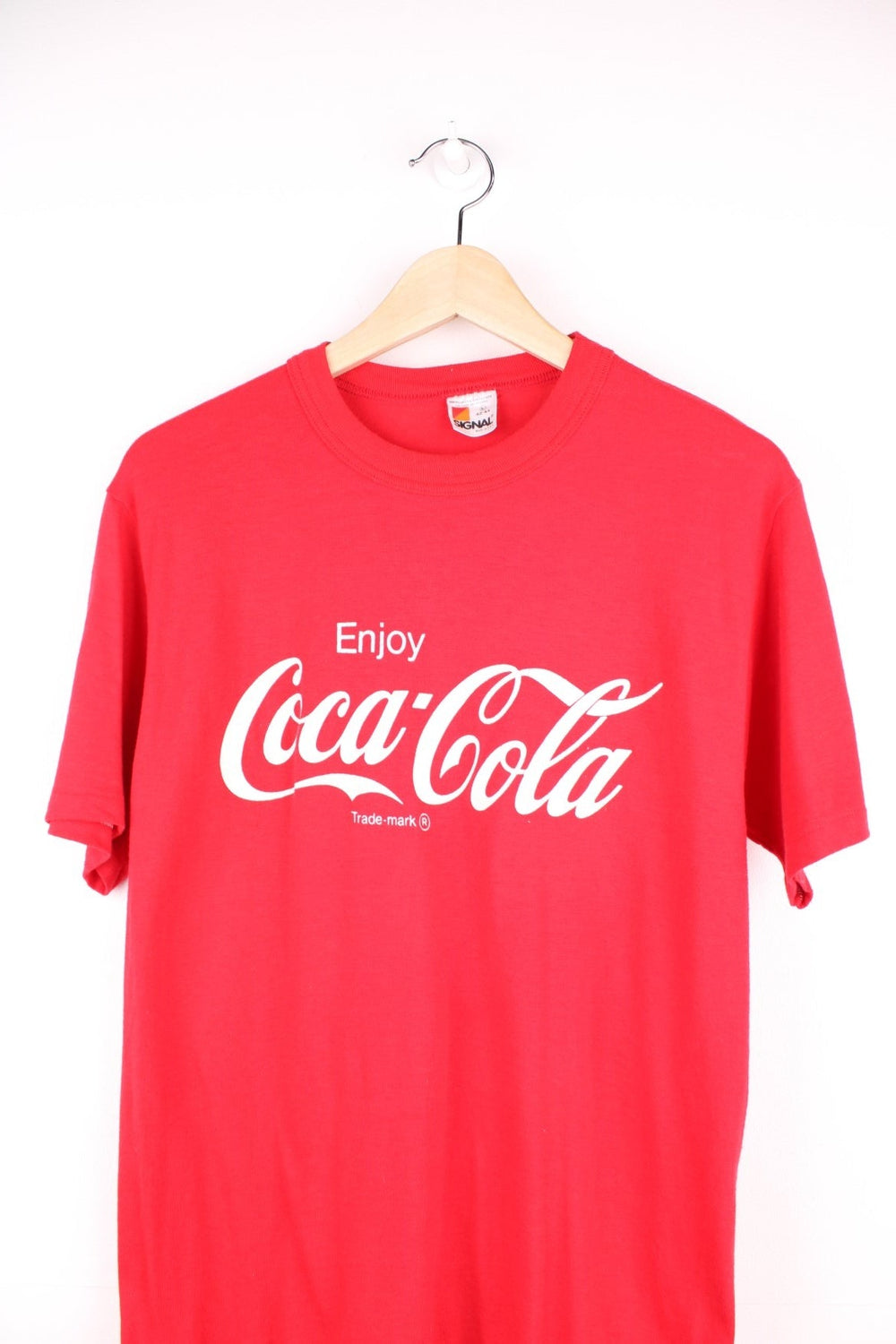 Vintage 90's Coca Cola T-Shirt in a red and white colourway with the spell out logo printed across the front.