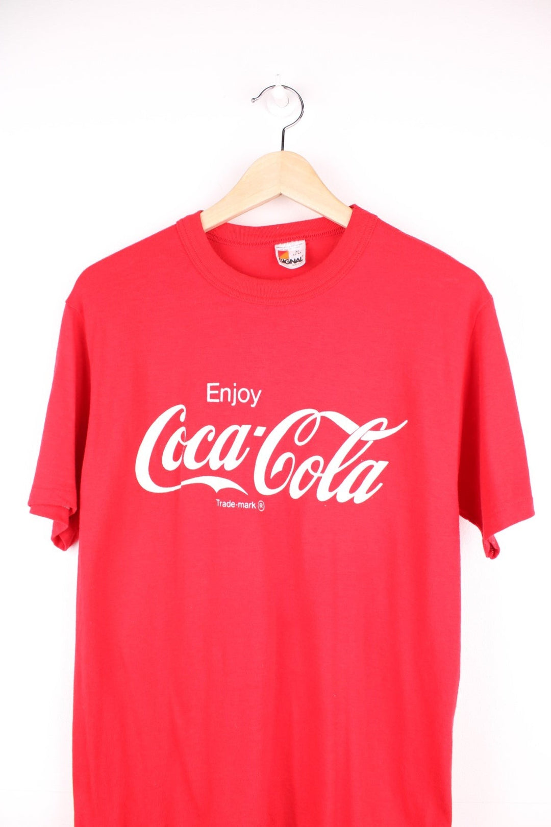Vintage 90's Coca Cola T-Shirt in a red and white colourway with the spell out logo printed across the front.