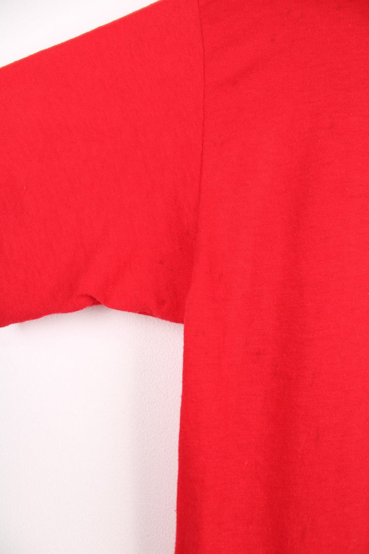 Vintage 90's Coca Cola T-Shirt in a red and white colourway with the spell out logo printed across the front.