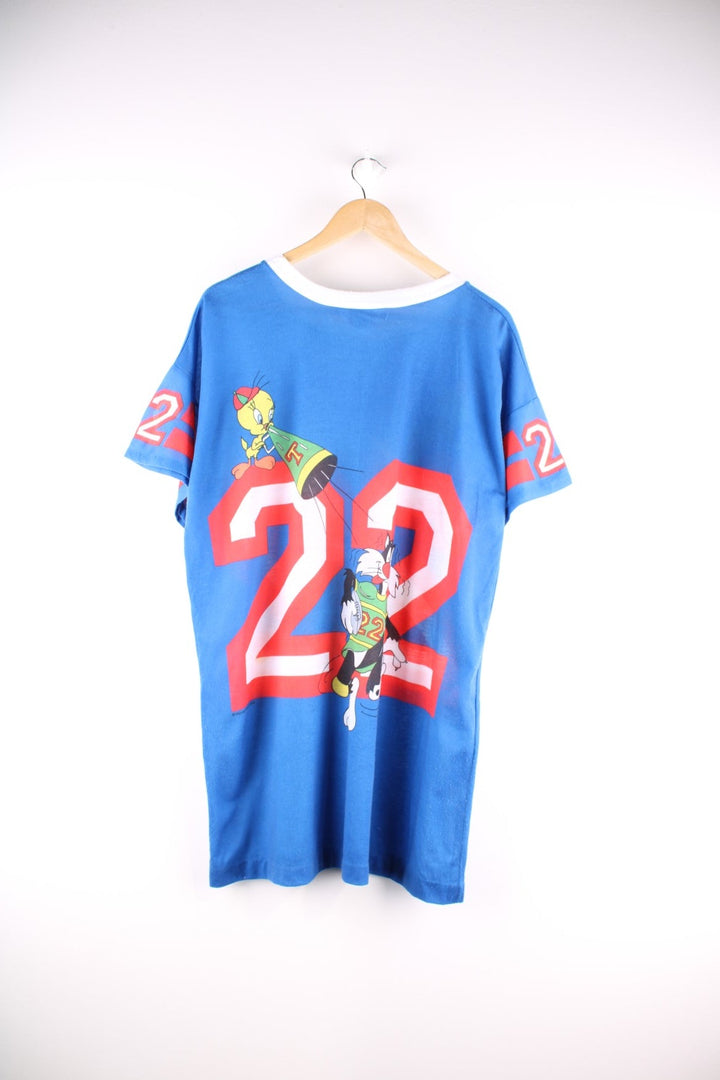 Vintage 1980s Jodie Arden Pyjama shirt in a blue colourway. There is a large graphic printed on the front, with Sylvester and Tweety and the sleeves are sports jersey style with a single stitch hem.