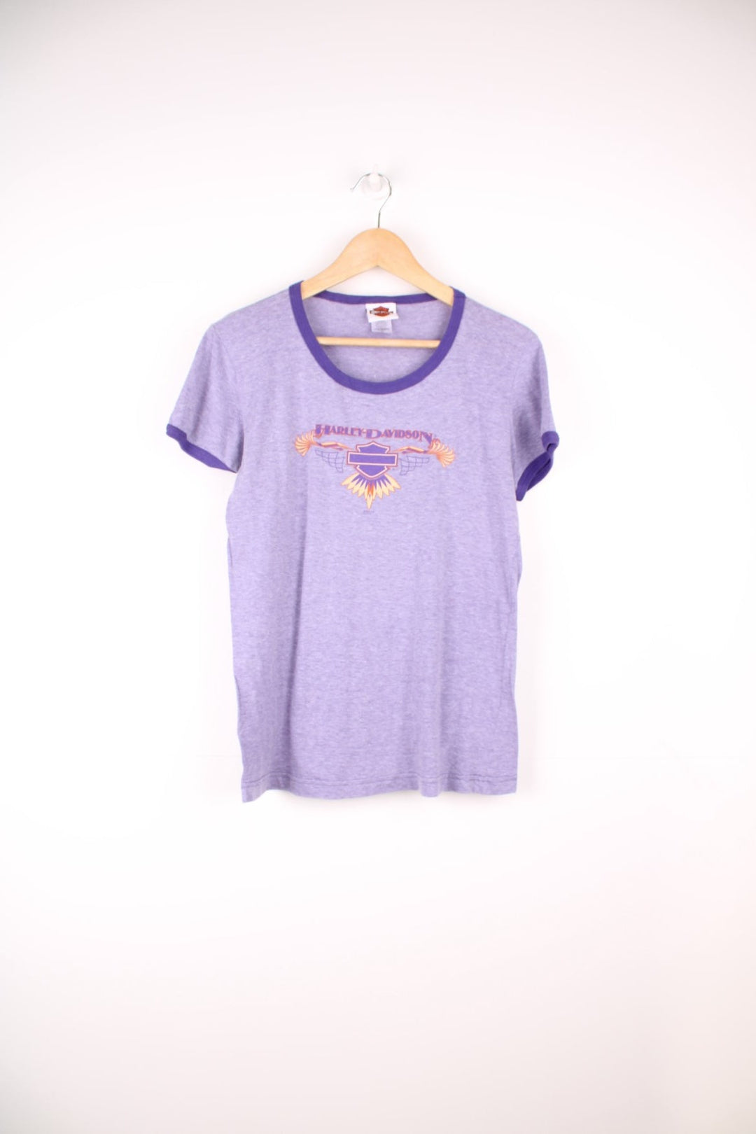 Women's Harley-Davidson ringer tee in a lilac colour way, features printed spell-out graphic on the front