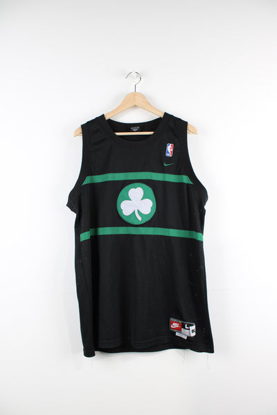Boston Celtics basketball jersey by Nike. Features Paul Pierce #34 embroidered logos/ lettering on the front/ back.  good condition- small section of the hem has come loose (see images)  Size in Label:  L - Length +2  Our Measurements:  Chest: 25 inches Length: 31 inches