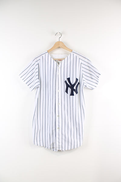 Vintage 80's New York Yankees baseball jersey with #23 printed on the back. The shirt is single stitch made by Fab-Knit.  good condition  Size in Label:  S  Our Measurements:  Chest: 21 inches