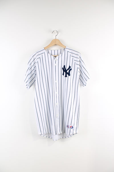 New York Yankees Majestic baseball jersey with #45 embroidered on the back  good condition - marks on the sleeve  Size in Label:  XL - Measures like a mens S  Our Measurements:  Chest: 21 inches Length: 29 inches