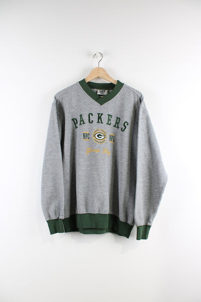 Vintage Green Bay Packers sweatshirt by Lee Sports with embroidered spell-out on the front  good condition  Size in Label:  Mens XL - Measures more like a L  Our Measurements:  Chest: 24 inches Length: 27 inches
