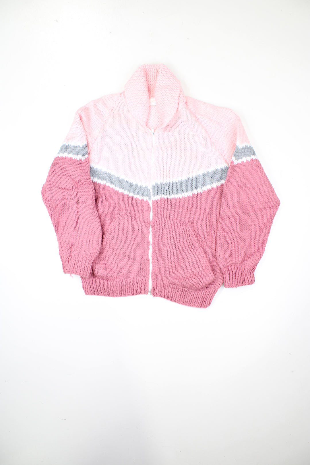 Vintage hand made pink and grey striped knit, zip through cardigan with pockets. Has a really charming label with previous owners name on