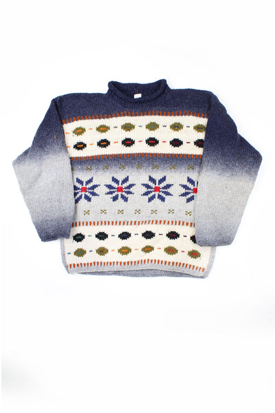 Vintage chunky knit wool jumper. Navy blue and cream ombré pattern with floral detail across the chest.  good condition  Size in Label:  No Size - Measures like a size L 