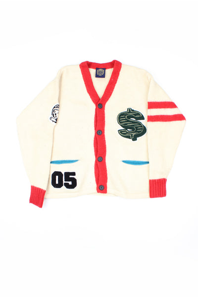 Billionaire Boys Club cream knit cardigan with red cuffs/ collar and embroidered patches throughout.  good condition - some light bobbling in places.  Size in Label:  Mens L - Measures more like a size M