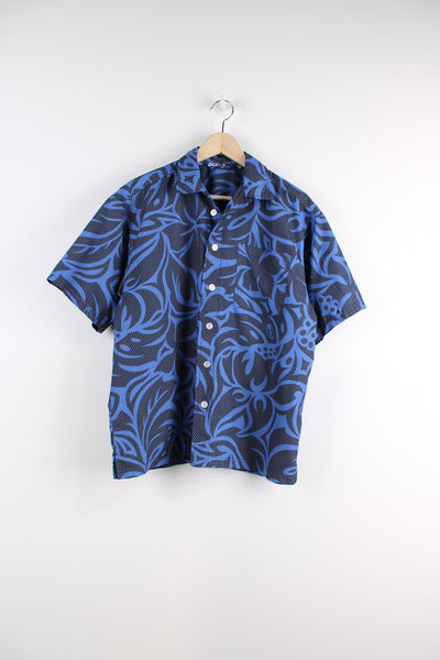 Quiksilver Short Sleeved Hawaiian Shirt in a blue and black colourway, button up with a chest pocket, and logo embroidered on the back.